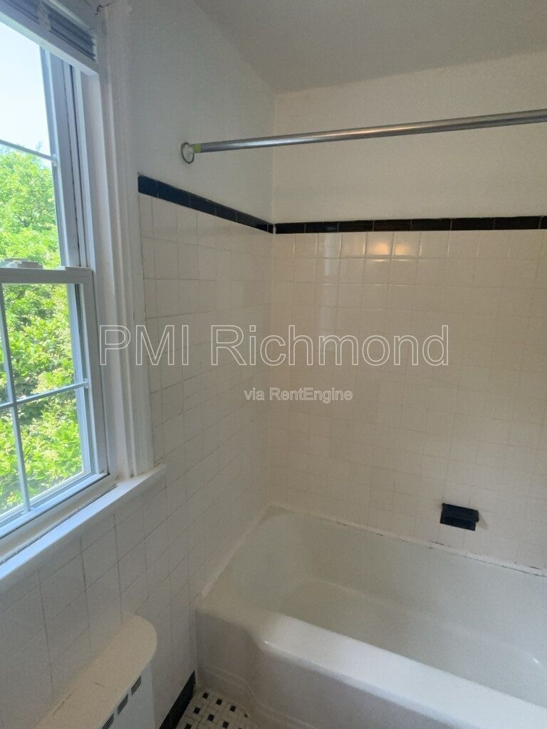 Charming 2-BR Home with Hardwood Floors & Cozy Screened-In Porch! property image
